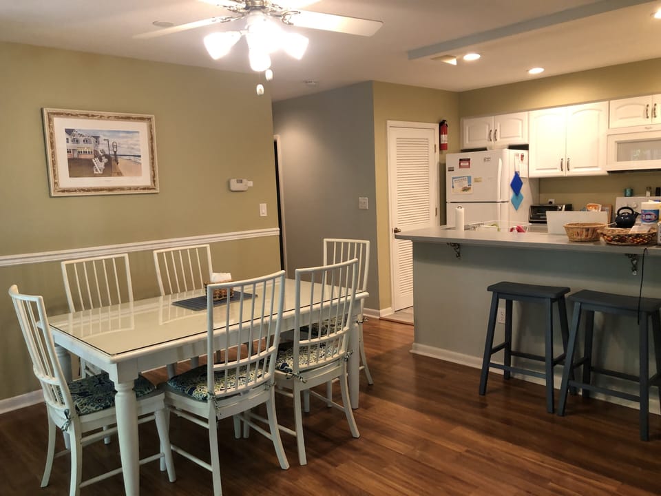 Dining room table has ample seating for six.