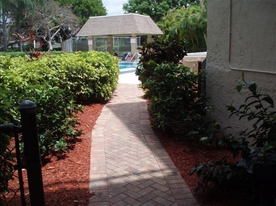 View from front door of condo...the pool (and grill) is only steps away!!!