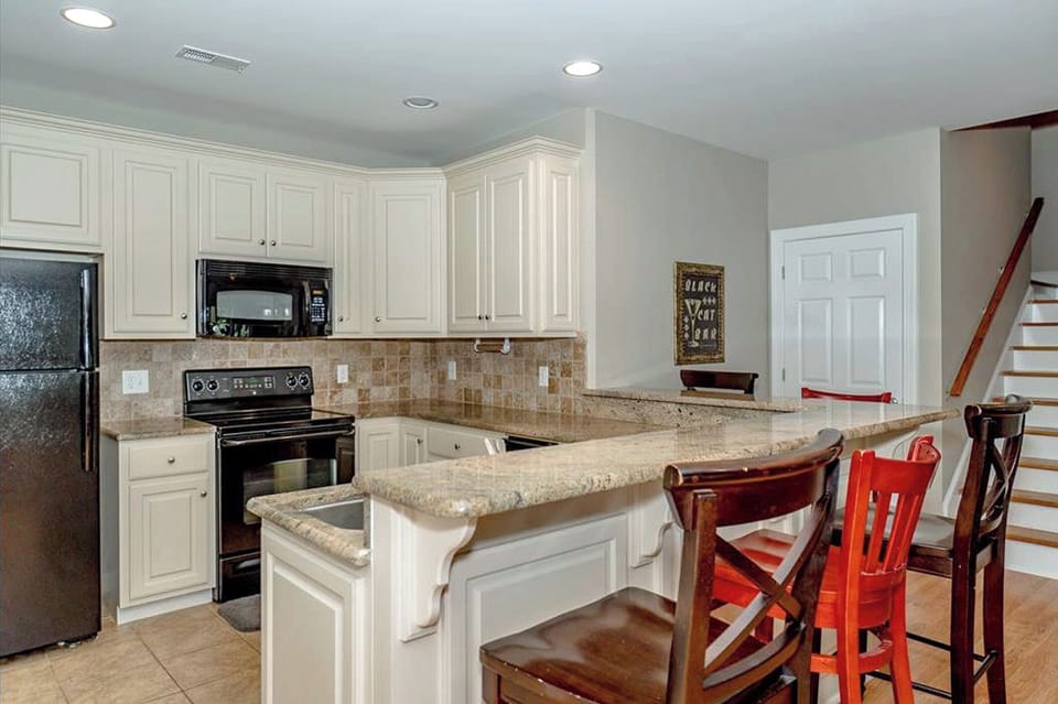 Lower level kitchen area - bar seating