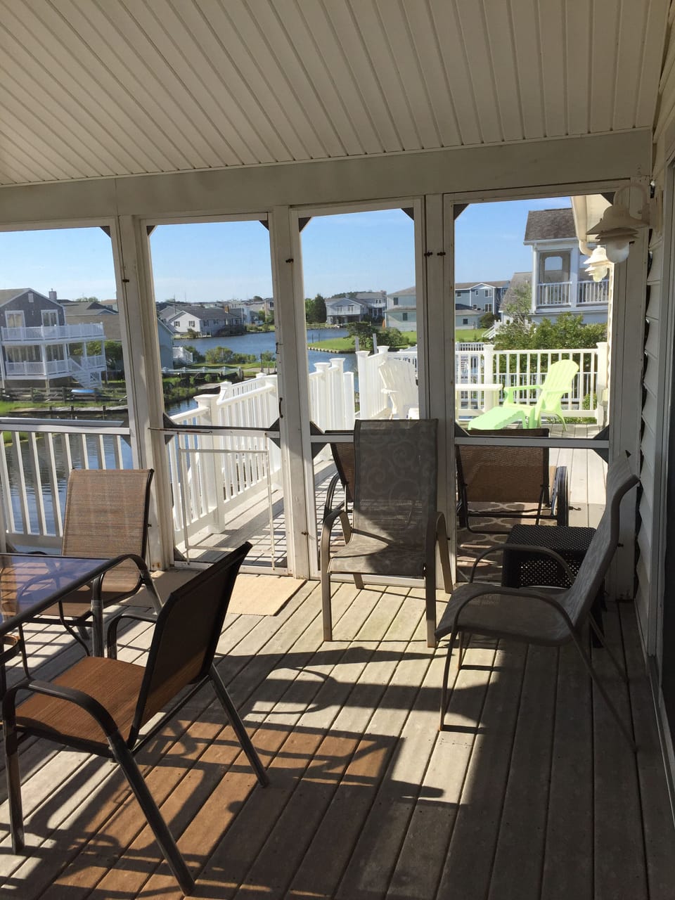 Back screened in porch and sun deck