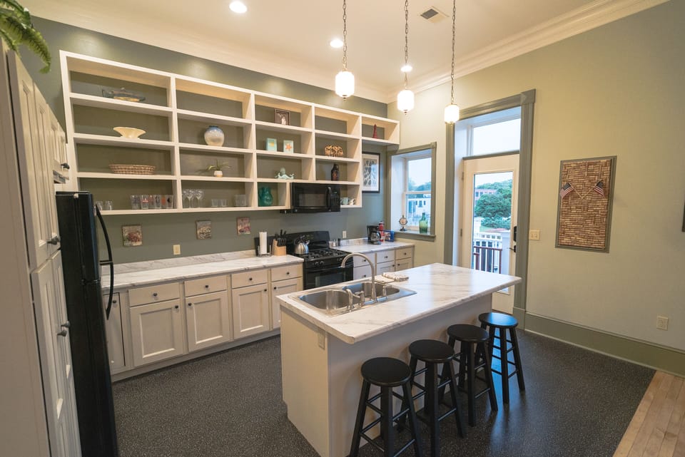 Kitchen is stocked with an assortment of pots and pans if you want to eat-in