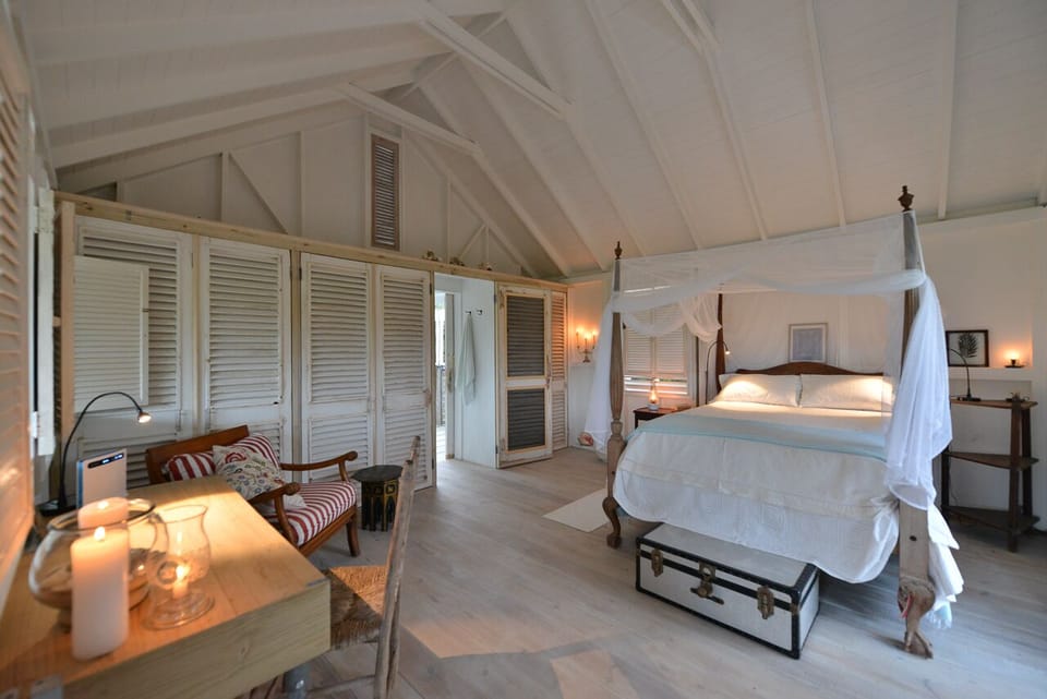 Bedroom - showing door through wardrobe to bathroom. Wide angle lens!
