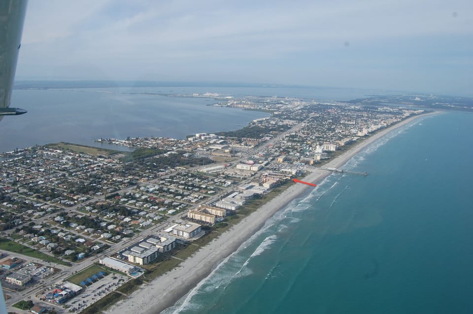 Aerial showing the coast south to north...the arrow is the Cocoa Beach Club.
