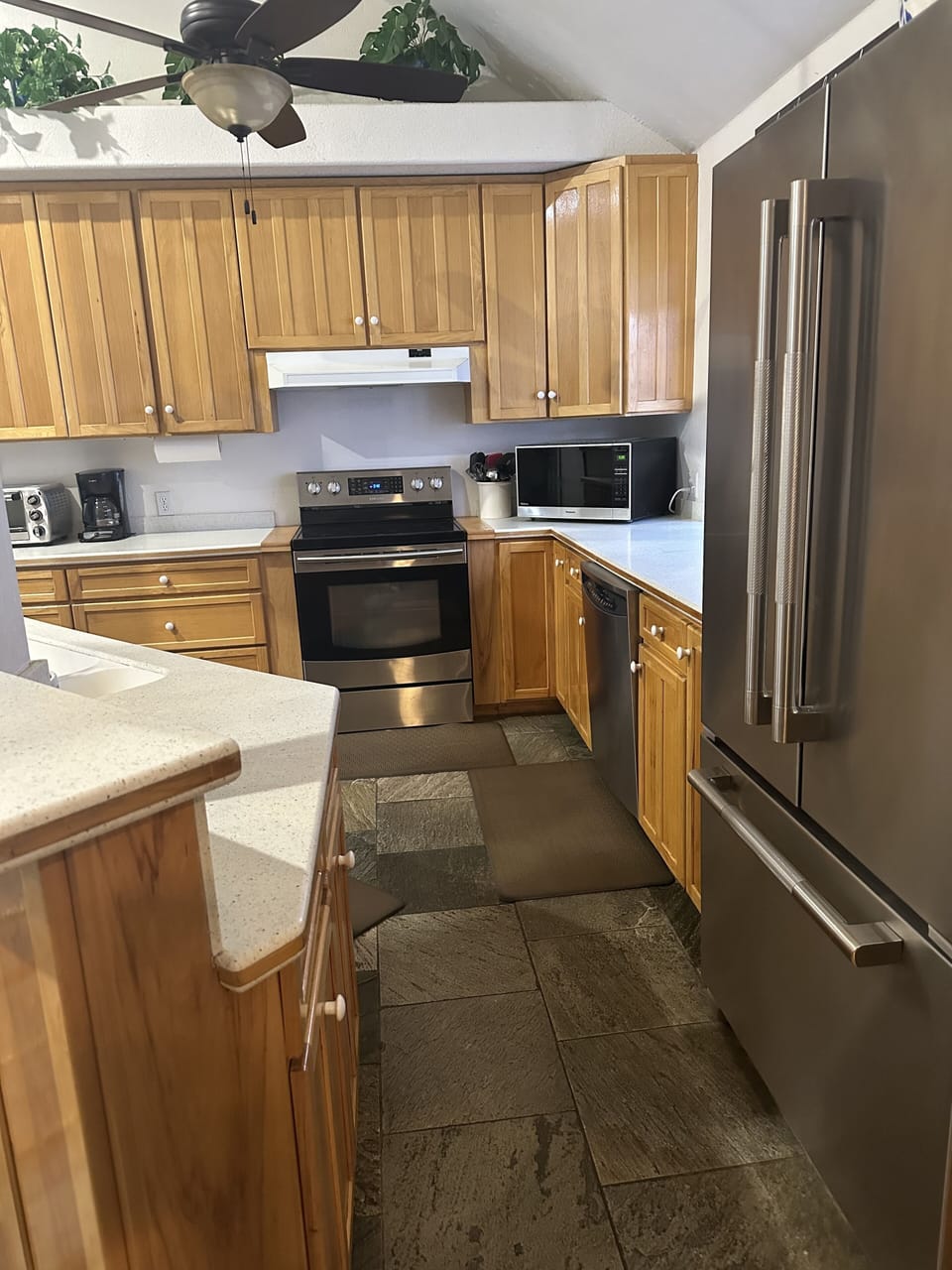 Kitchen has all stainless appliances