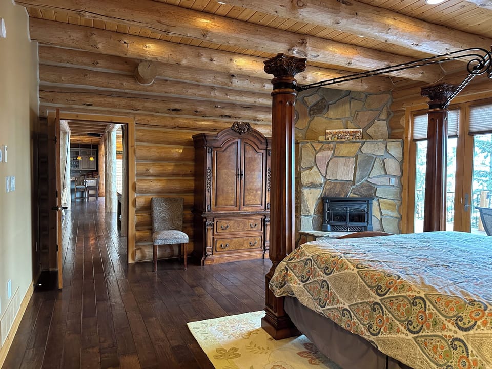 Master bedroom suite on main level. A king size tempurpedic bed w/gas fireplace