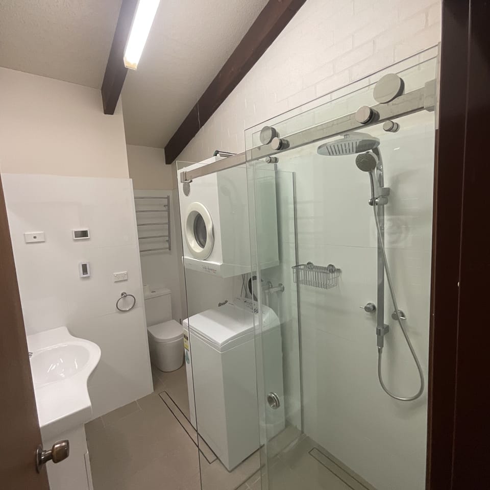 Main bathroom, heated towel rack, heated floor, infra red heater, rain shower.