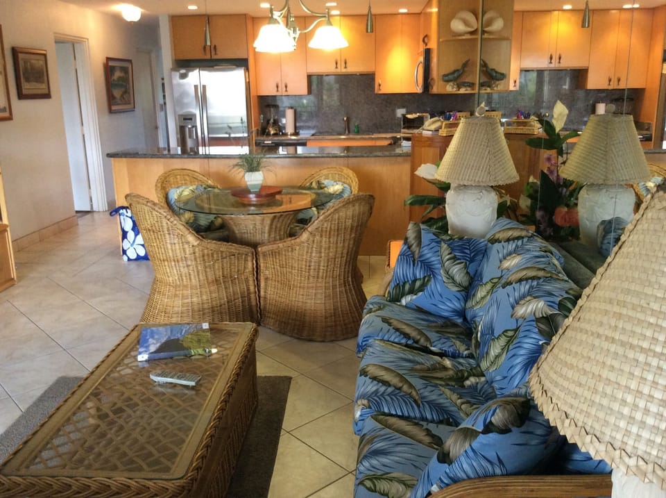 Open living room with new cushions on couch and love seat. NEW sleeper sofa also