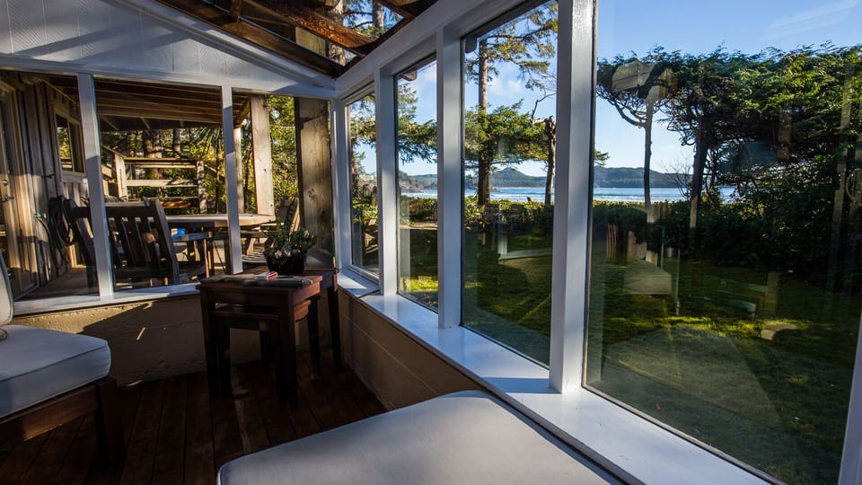 The glassed-in sun room is a great place to relax and watch the ocean.