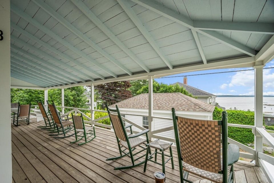 Enjoy a morning cup of coffee or an evening glass of wine on the beautiful covered porch