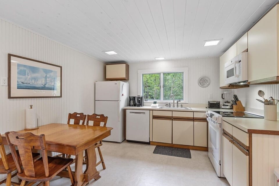 Spacious kitchen stocked with basic guest amenities