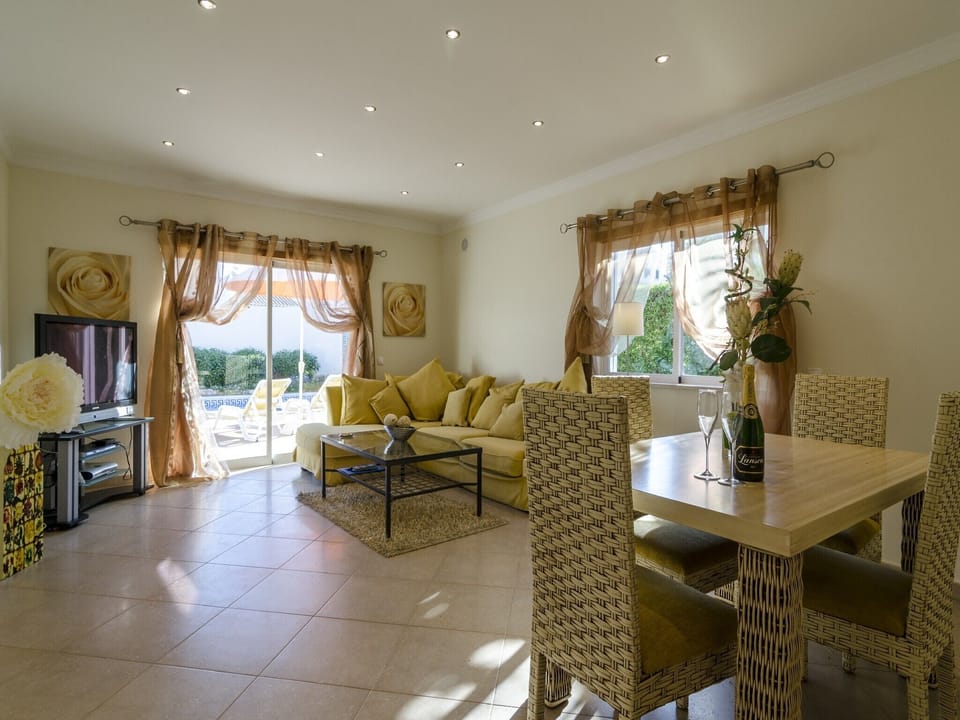 Beautiful lounge looking over the pool. Full use of satellite TV and internet.