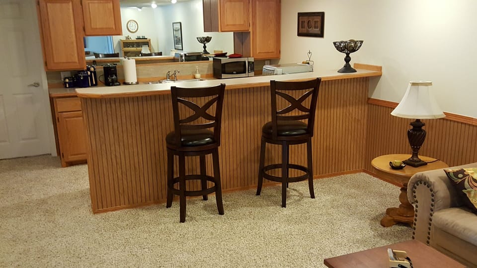 Kitchenette & Breakfast Bar Seating from living room side