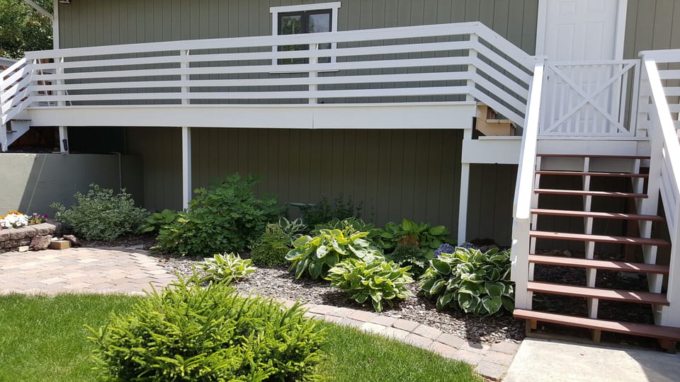 Entrance Steps & lawn flower garden area for apartment. 