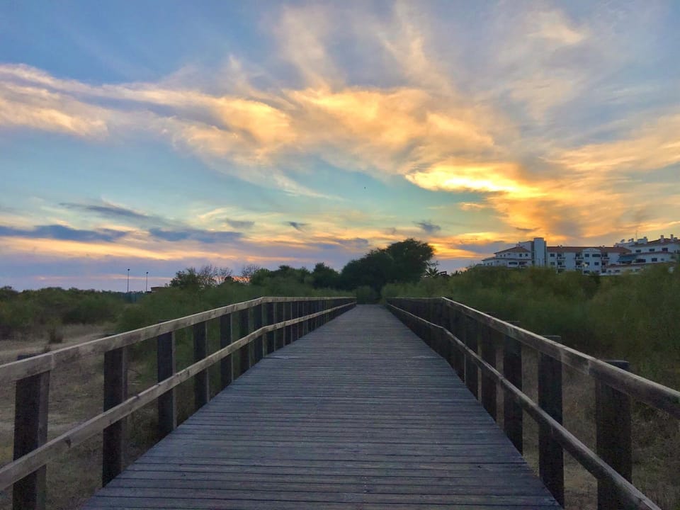 walk by the beach at sunset