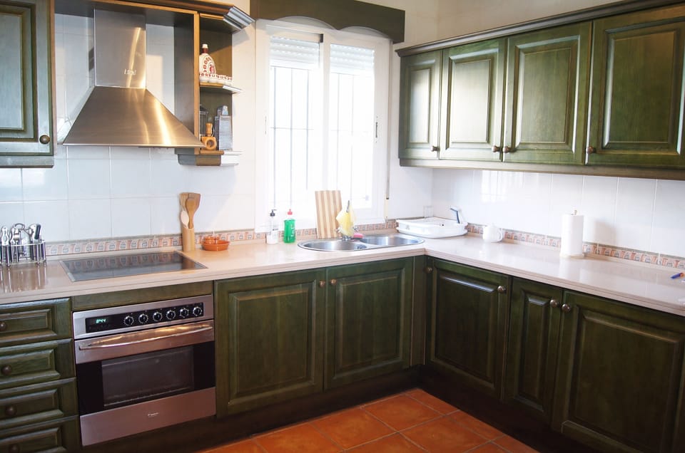Bright and airy kitchen with appliances