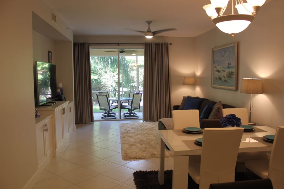 Open floor plan with new tile flooring throughout.