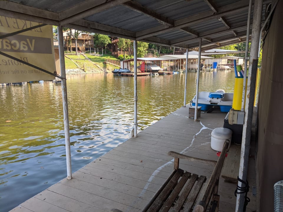 Spacious wrap-around dock with pedal boat for guests use