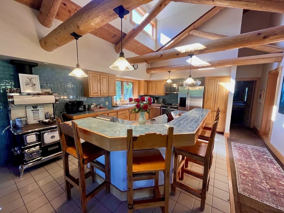 Open kitchen with bar seating