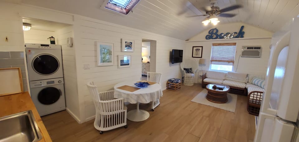 Our upgraded living room with a mini laundry room