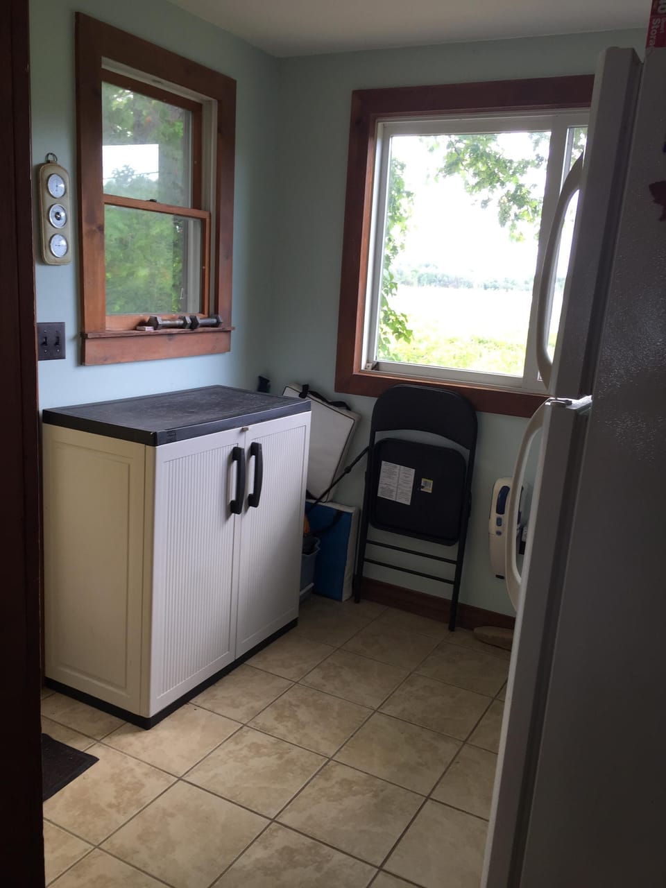 back entrance, view of Cranberry Pond. This is where fridge, washer & dryer are.