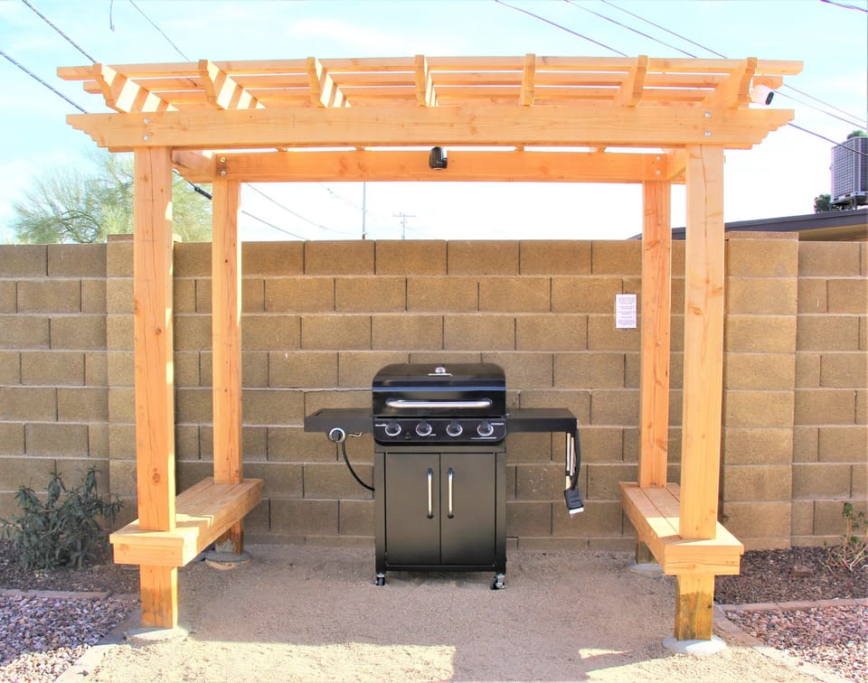 Great BBQ with shaded pergola, bench seats