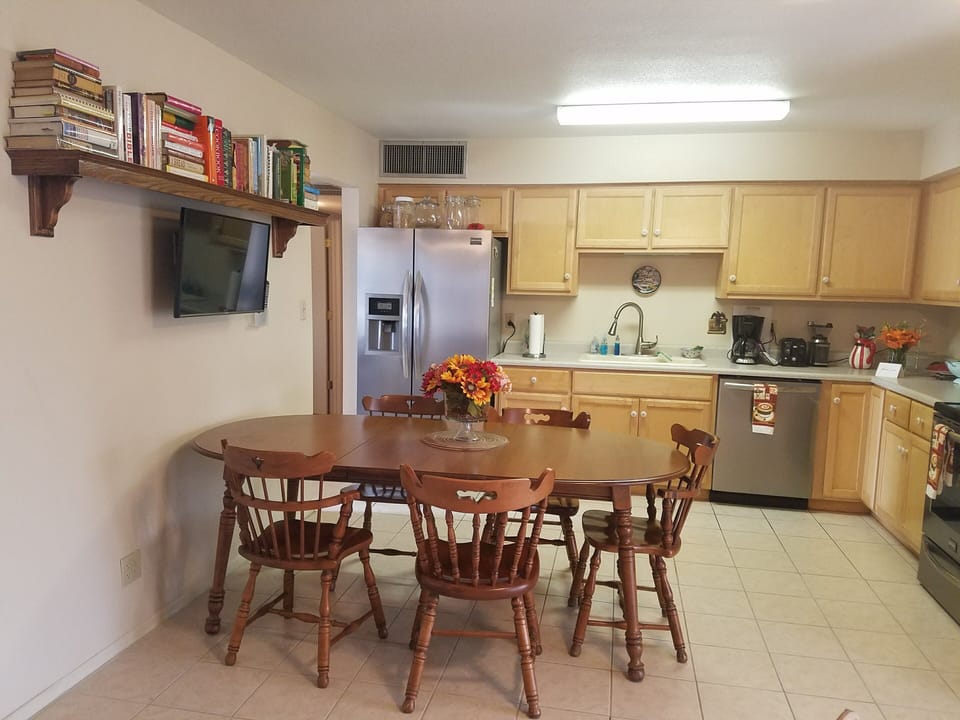Roomy Kitchen, seats 8, all new appliances! Cookbooks, dishes, pots and pans!