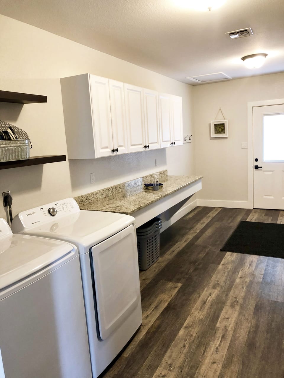 Our extra large laundry room offers guests a full washer & dryer + storage.