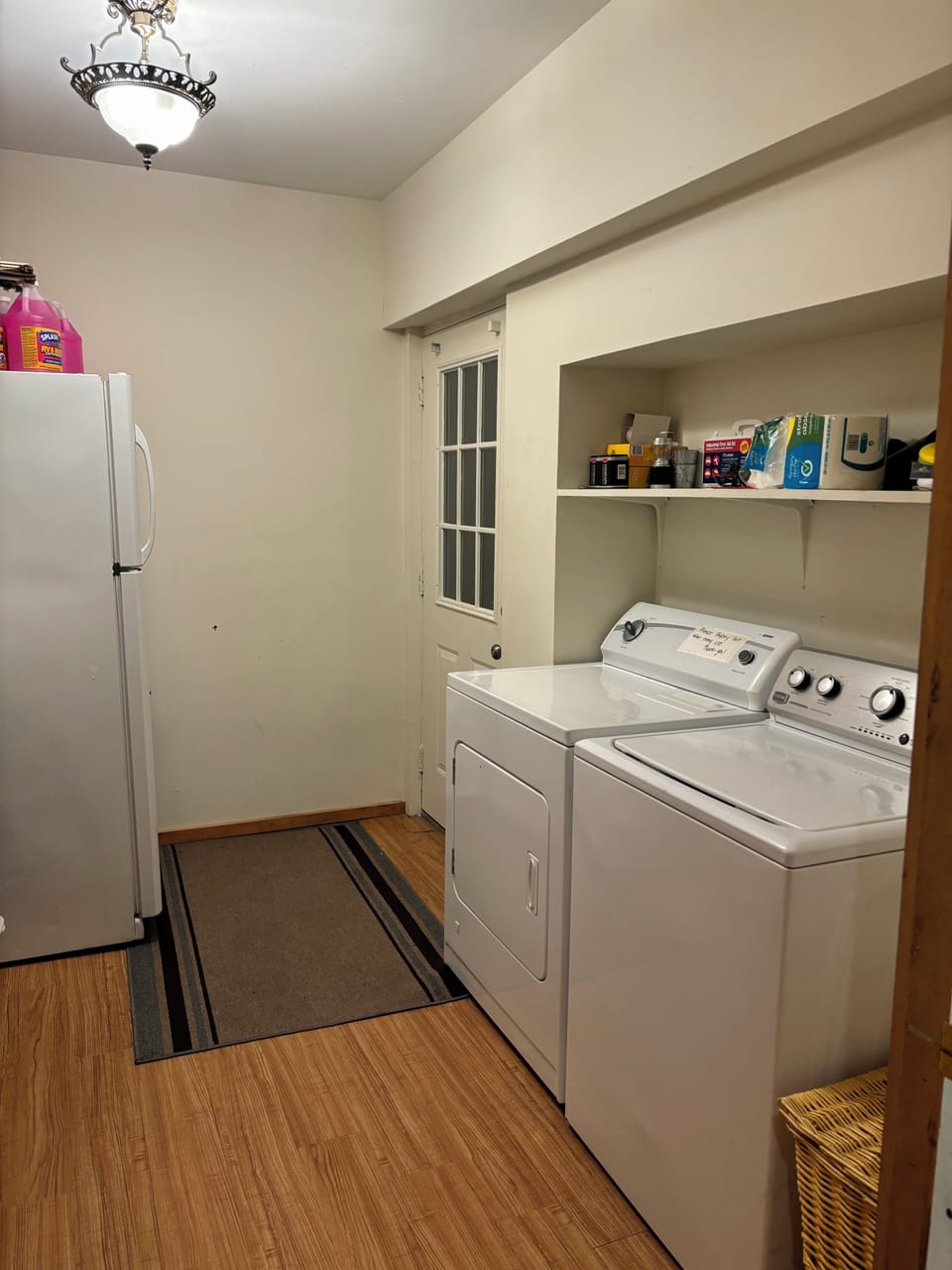 Laundry room with extra fridge 