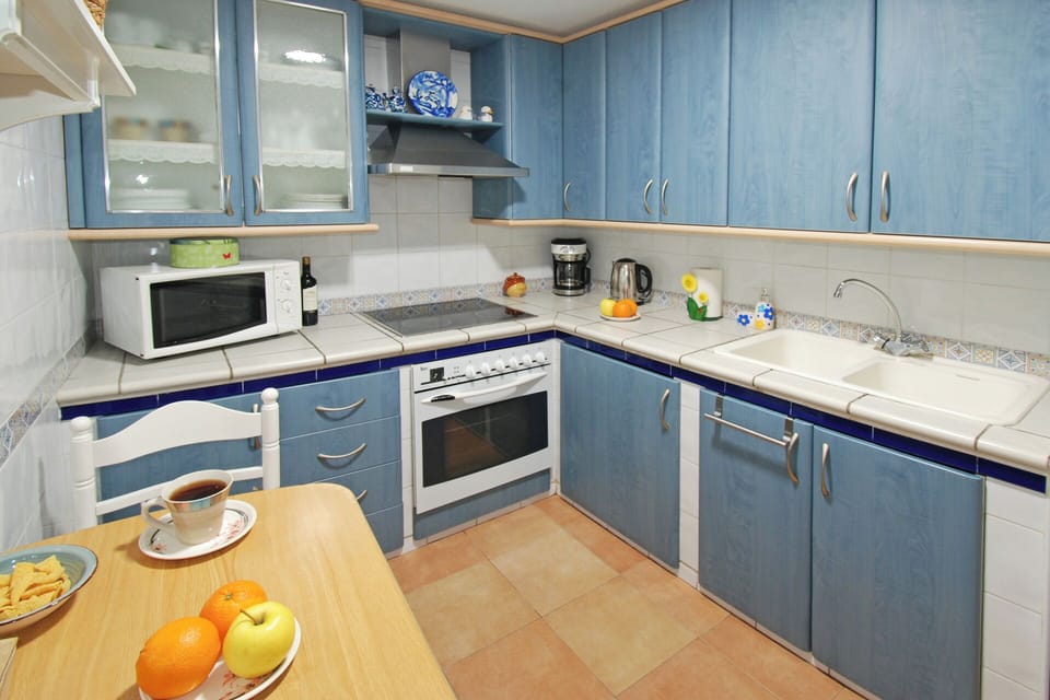 The kitchen is excellently equipped with induction hob and all amenities.
