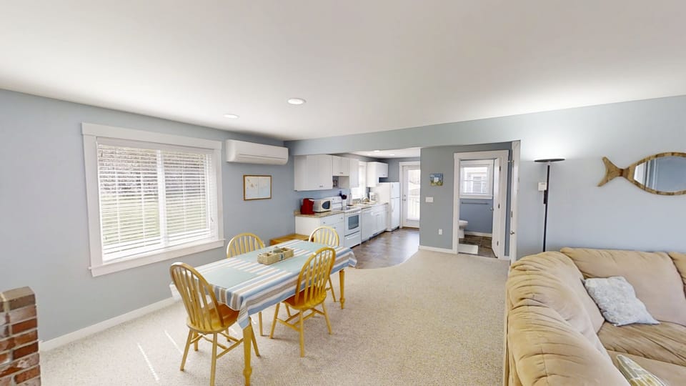 Open dining/ kitchen and living area.