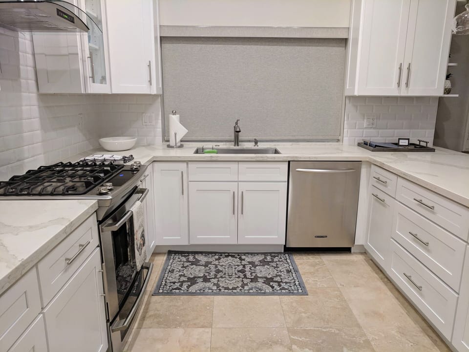 Large fully equipped kitchen with built in pantry