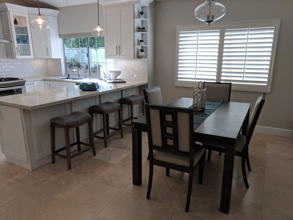 Dining Room seats four, table can be expanded & peninsula seating for three 