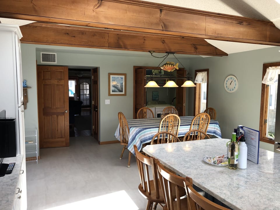 Full size washer and dryer located just off the kitchen