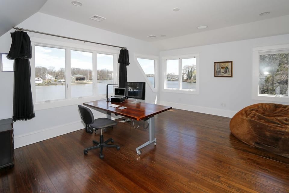 Office on second floor with panoramic lake views: can be used as  fourth bedroom
