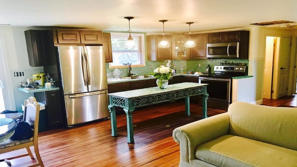 open floor plan with new appliances for kitchen