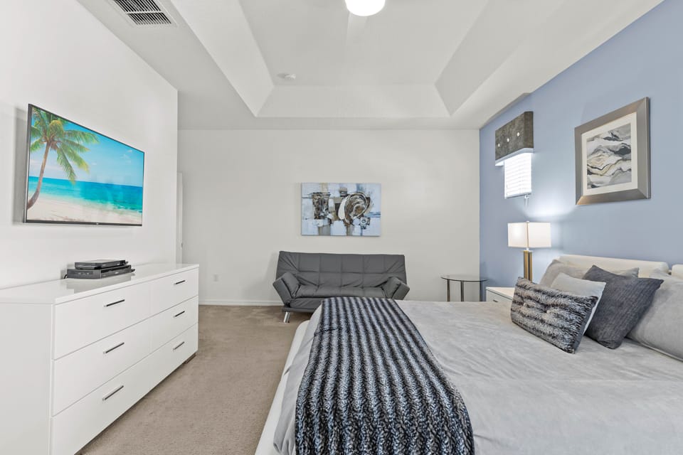 Seating as well as a king bed
