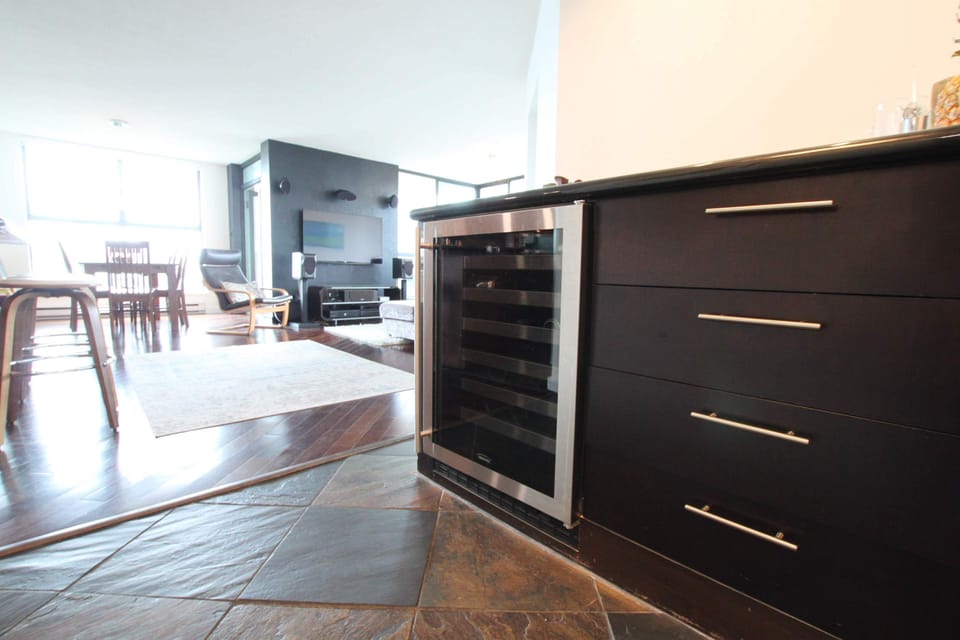 Wine fridge and dry bar.
