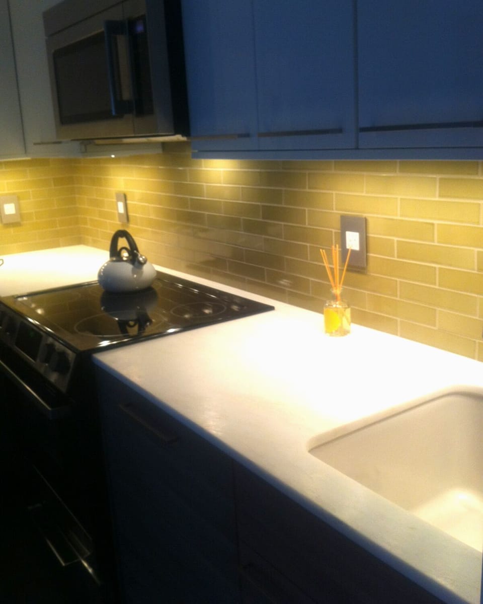 Newly remodeled, sleek Kitchen with marble counter tops and heated floors