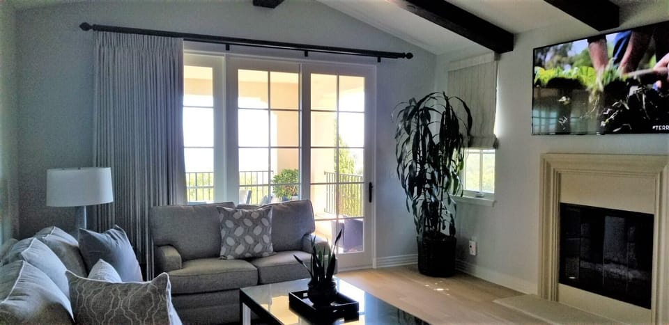 Living Room with Fireplace, Large HDTV, Sleeper Queen Sleeper & Ocean Vu Balcony
