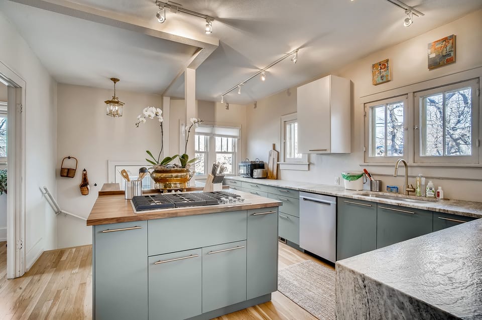 Luxuriously spacious countertops throughout the kitchen.