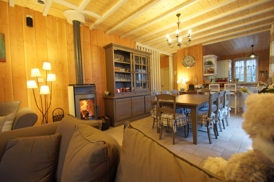 The mild heat of the wood stove