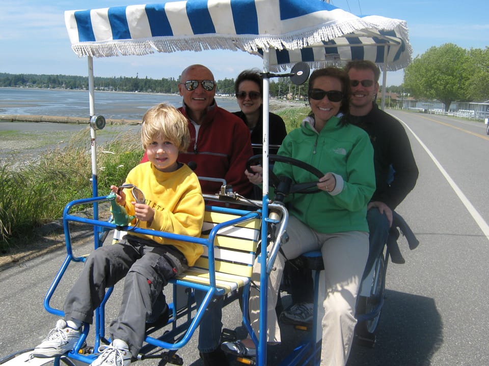 Ride a rented pedal car along the bay