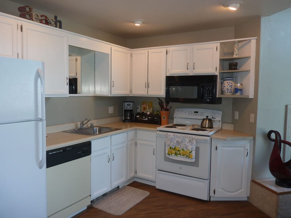 There's everything you need to whip up a meal. New s/s dishwasher not shown. 
