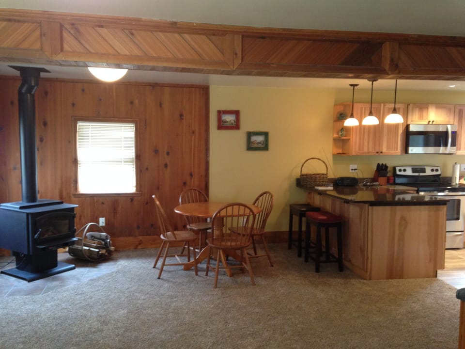 Cozy fireplace, and large peninsula for cooking, eating, playing games/puzzles.
