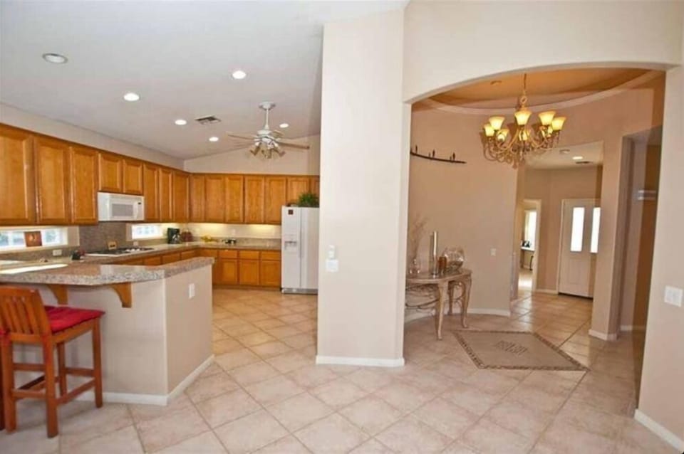 Beautiful tiled entry and kitchen.