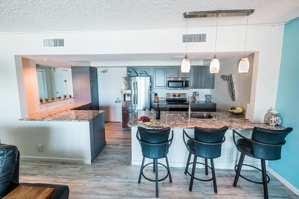 View of the kitchen and convenient breakfast bar from the living room 