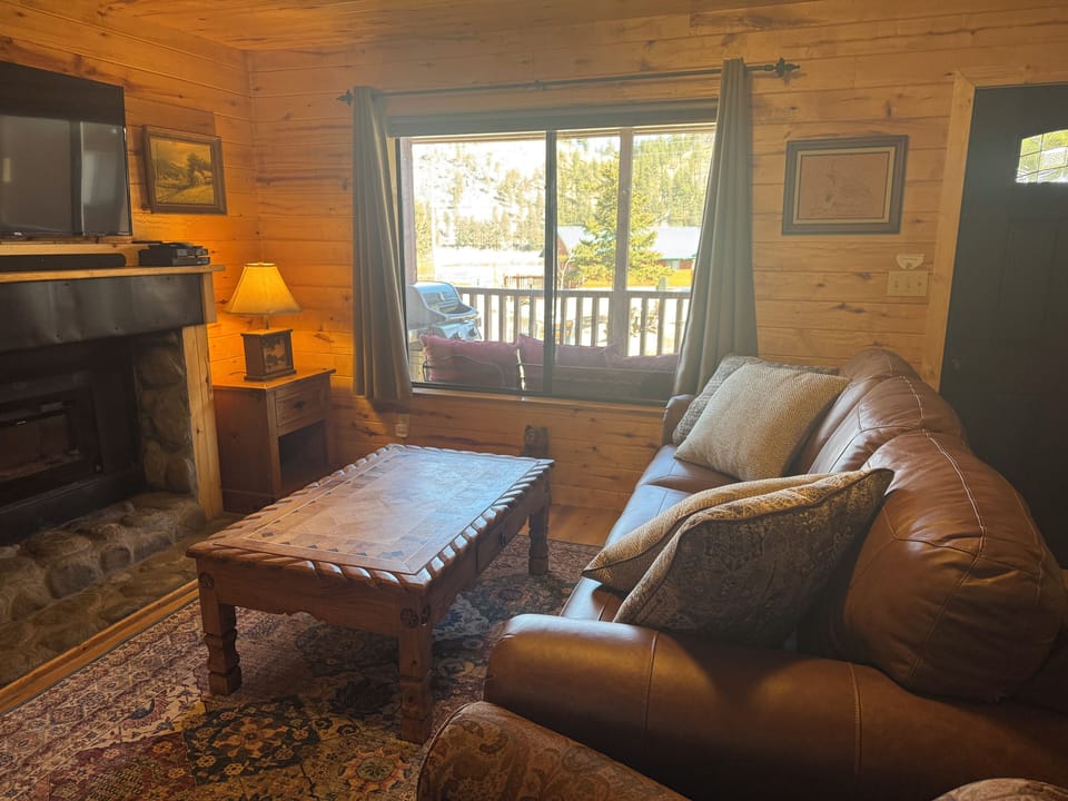 View of pond and porch from window.  
