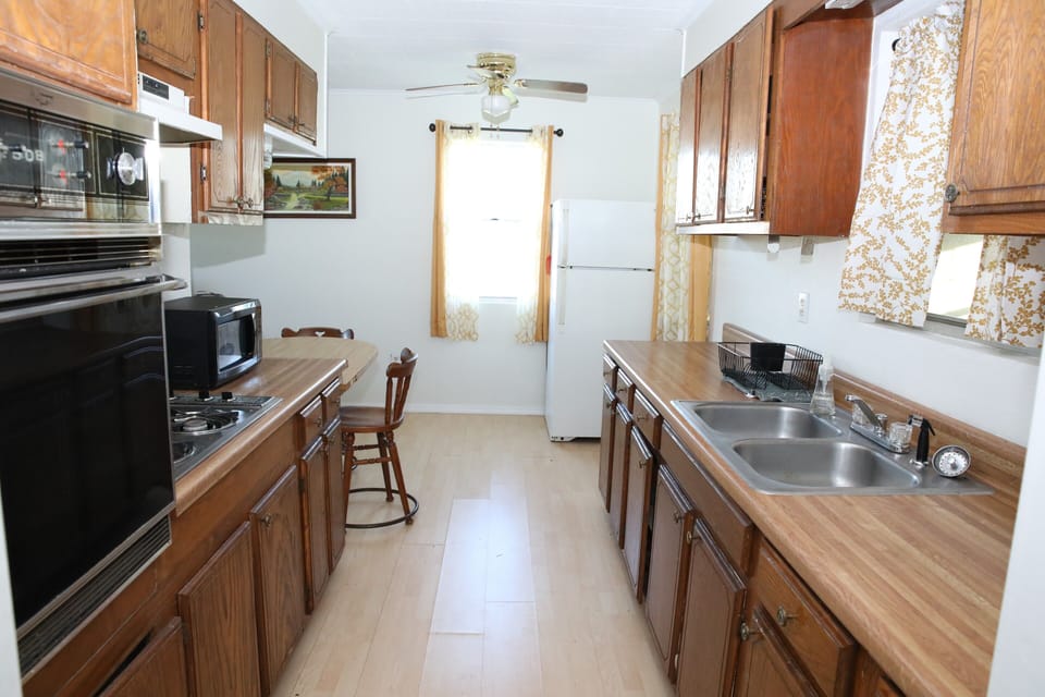 Fully Equipped Kitchen and Dining Area with All the Essentials"