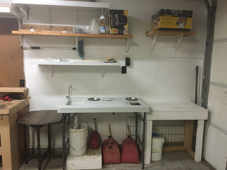 Fish cleaning station, deep fryers, electric skillet year round in heated garage