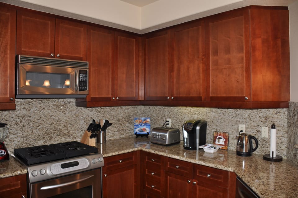 Kitchen with all convenient appliances including Kurig Coffee Maker
